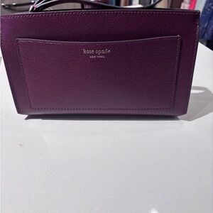 New Kate Spade Ava Wristlet, Cordovan. Valued as $150.